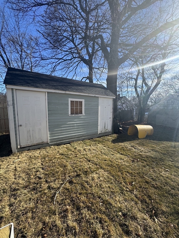 12 Bronx Road Boston, MA 02132 - Photo 23 of 31 a backyard of a house