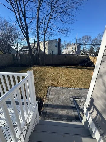 a view of balcony with furniture