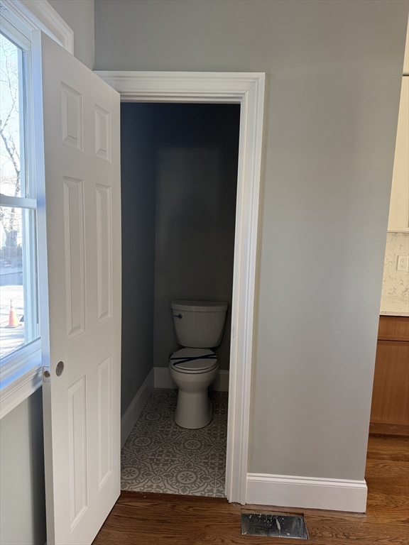 12 Bronx Road Boston, MA 02132 - Photo 28 of 31 a bathroom with a toilet