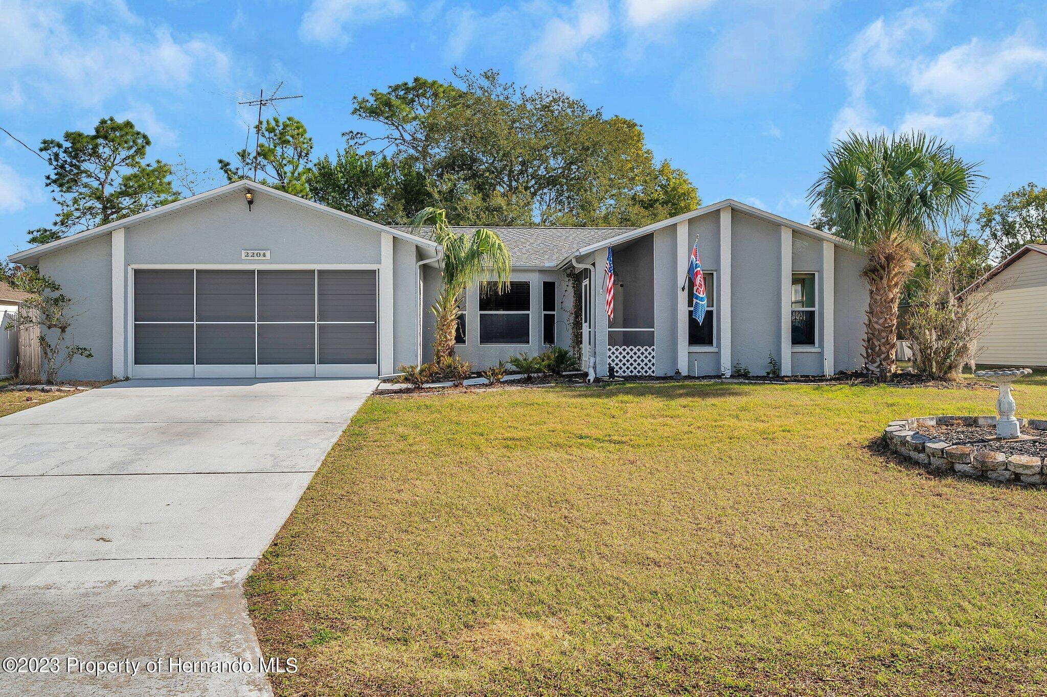 2204 Gold Spring Hill Spring Hill, FL 34609 - Photo 1 of 31 Front view