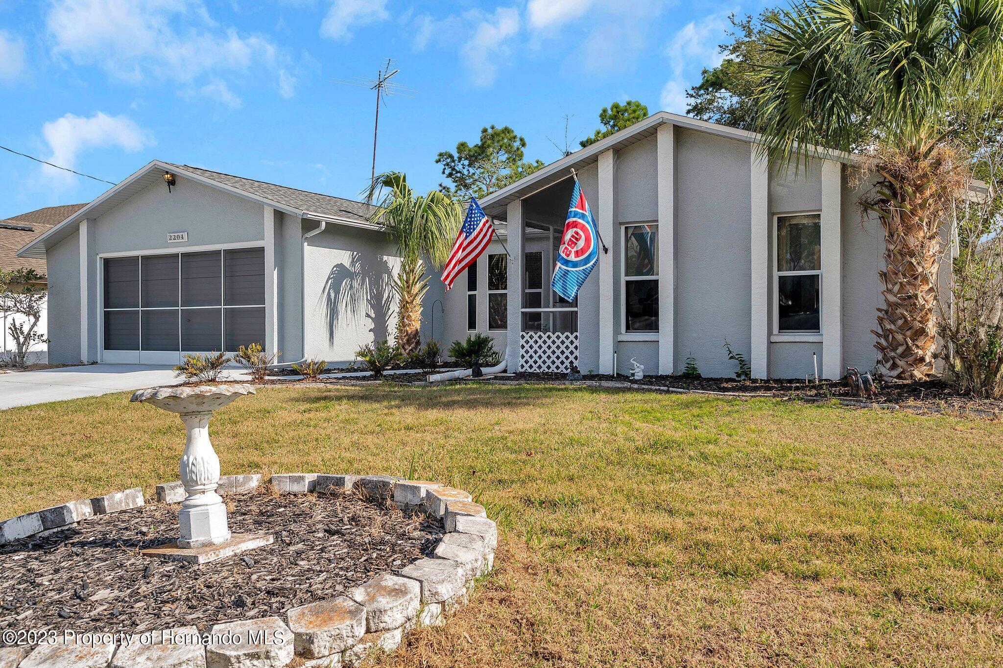 2204 Gold Spring Hill Spring Hill, FL 34609 - Photo 3 of 31 63-web-or-mls-TTP_8321