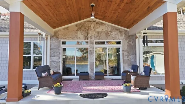 a view of a swimming pool with a patio