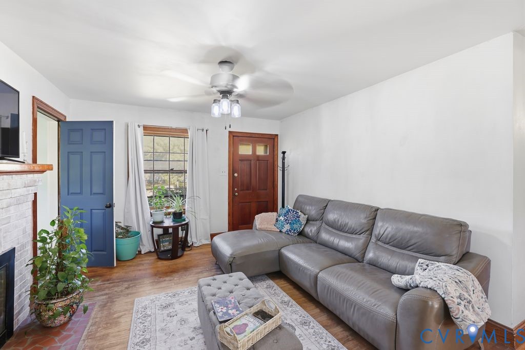 3200 Manorcrest Road Richmond, VA 23234 - Photo 7 of 34 a living room with furniture and a window
