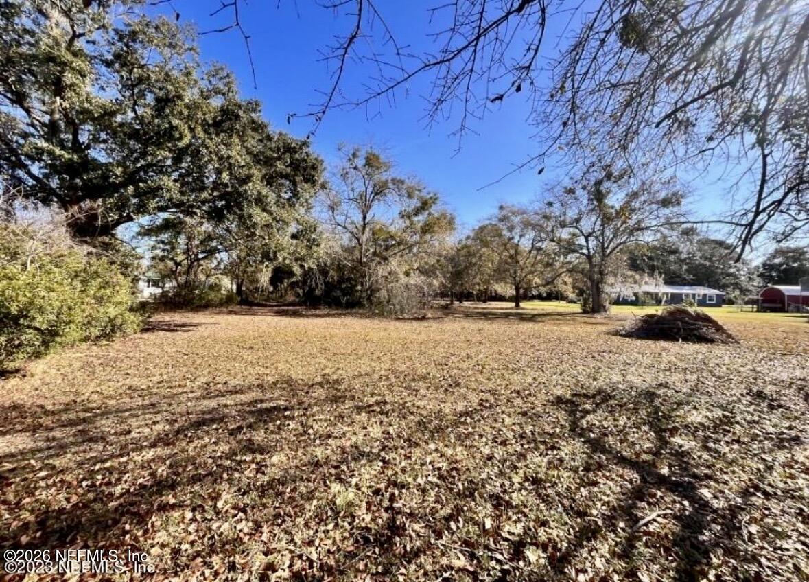 0 West Lawrence Road Fernandina Beach, FL 32034 - Photo 2 of 4 a view of yard covered with snow