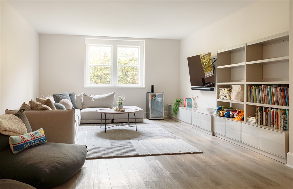 36 Patton Road Wellesley, MA 02482 - Photo 17 of 24 a living room with furniture and a flat screen tv