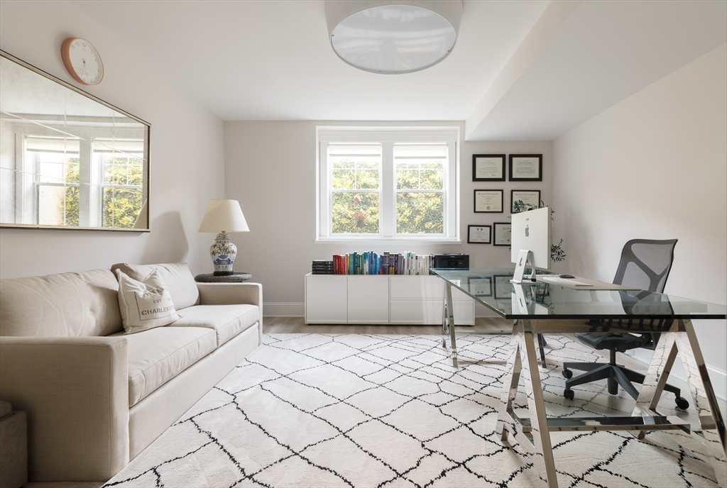 36 Patton Road Wellesley, MA 02482 - Photo 18 of 24 a living room with furniture a table and a large window