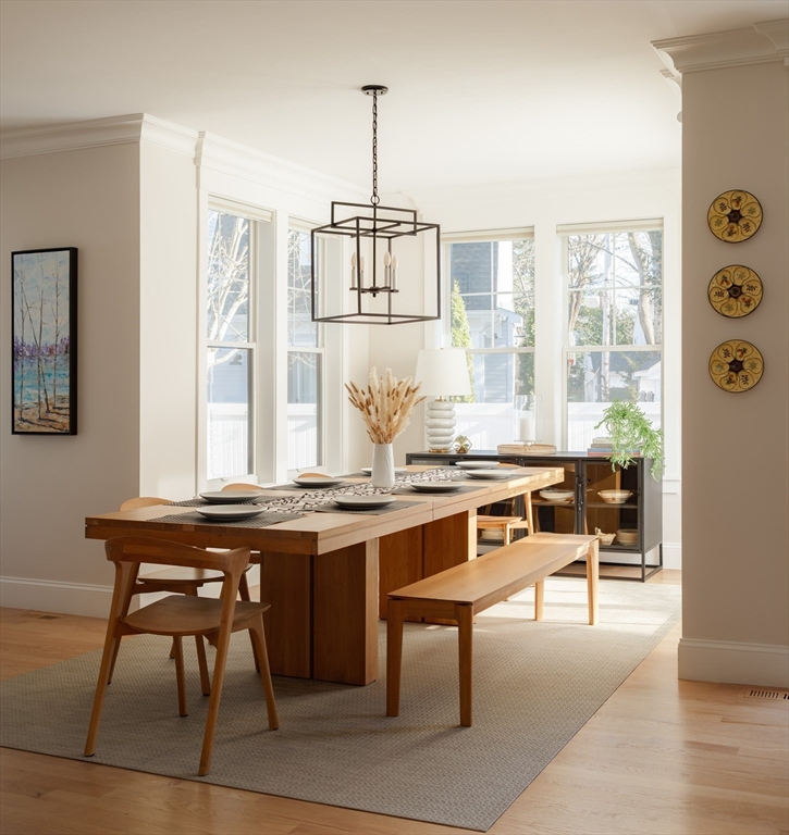 36 Patton Road Wellesley, MA 02482 - Photo 8 of 24 a dining hall with stainless steel appliances granite countertop a stove and a dining table with chairs