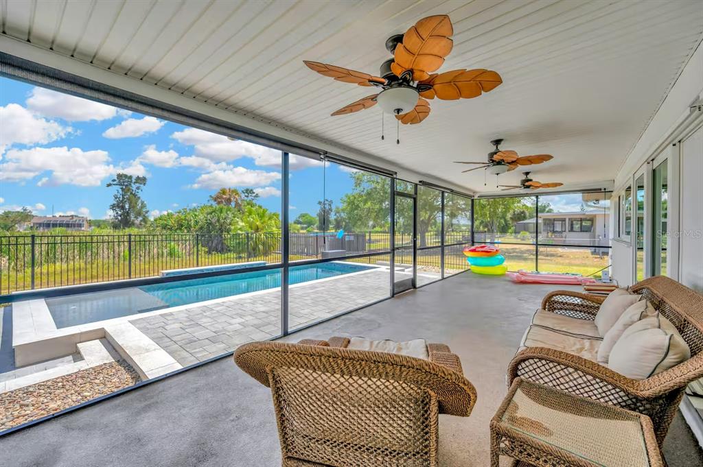 721 Eagle Lane Apollo Beach, FL 33572 - Photo 23 of 48 a bed sitting in a room next to a window