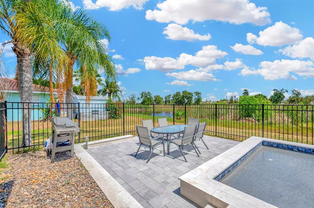 721 Eagle Lane Apollo Beach, FL 33572 - Photo 41 of 48 a view of a lake with couches and city view