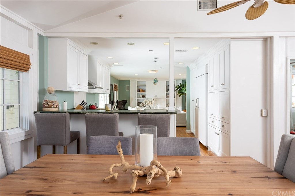 107 High Drive Laguna Beach, CA 92651 - Photo 12 of 35 a living room with stainless steel appliances kitchen island granite countertop furniture and a fireplace