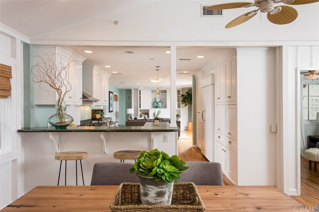 107 High Drive Laguna Beach, CA 92651 - Photo 16 of 35 a dining room with furniture and wooden floor