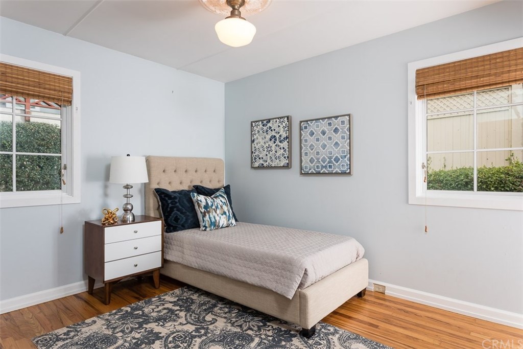 107 High Drive Laguna Beach, CA 92651 - Photo 25 of 35 a bedroom with a bed and a window