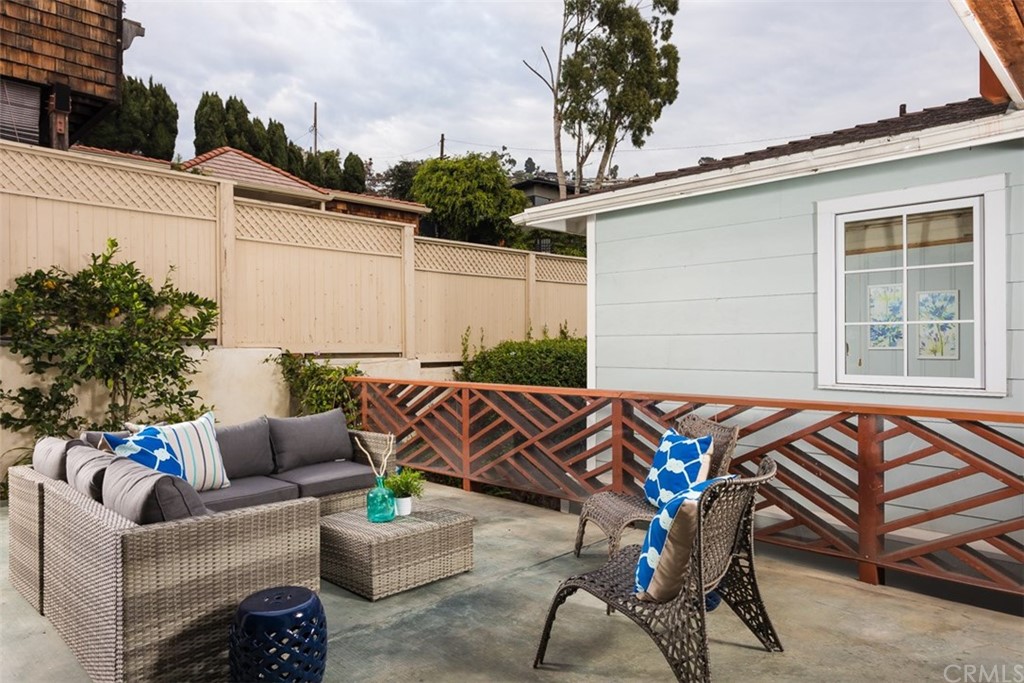 107 High Drive Laguna Beach, CA 92651 - Photo 26 of 35 a view of patio with a table and chairs
