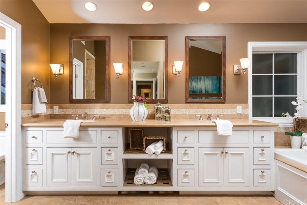 107 High Drive Laguna Beach, CA 92651 - Photo 29 of 35 a bathroom with cabinets appliances and a window