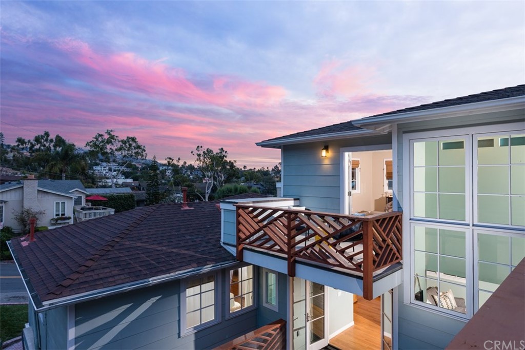 107 High Drive Laguna Beach, CA 92651 - Photo 32 of 35 a view of a roof deck with wooden floor and a houses