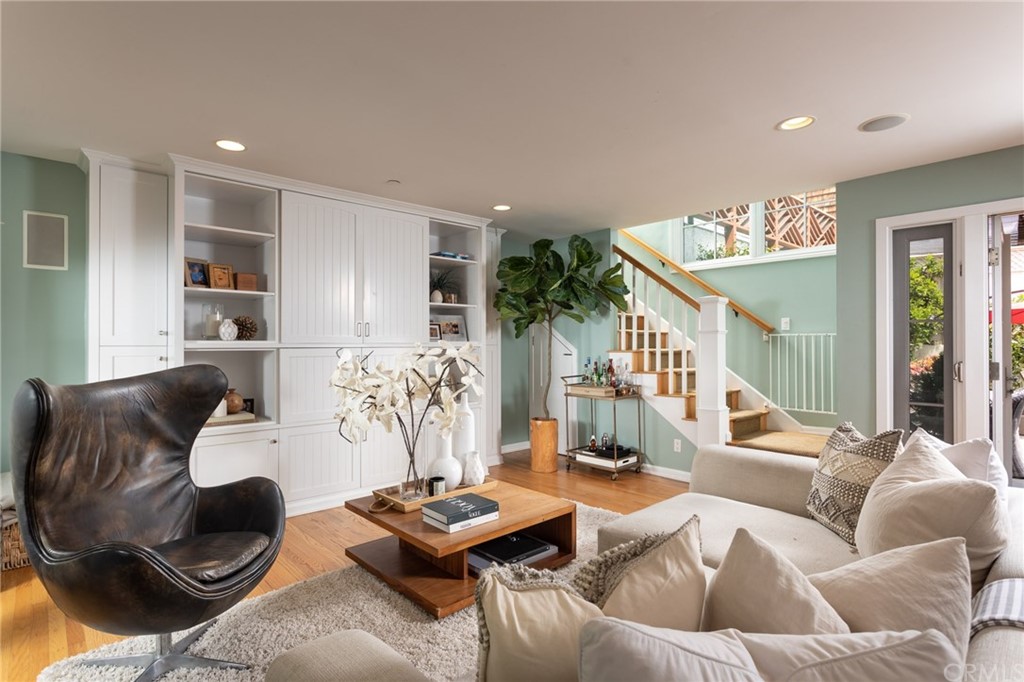 107 High Drive Laguna Beach, CA 92651 - Photo 10 of 35 a living room with furniture and a chandelier