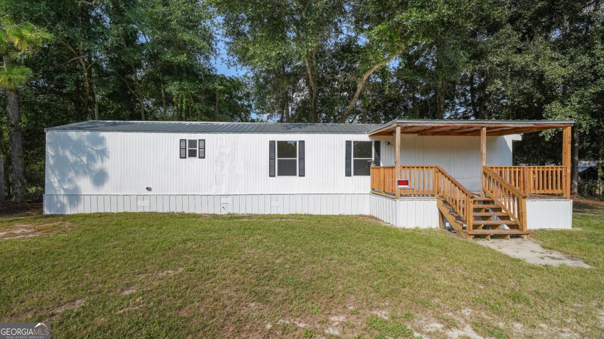 50 Sangster Road Jesup, GA 31545 - Photo 10 of 22 an aerial view of a house with backyard