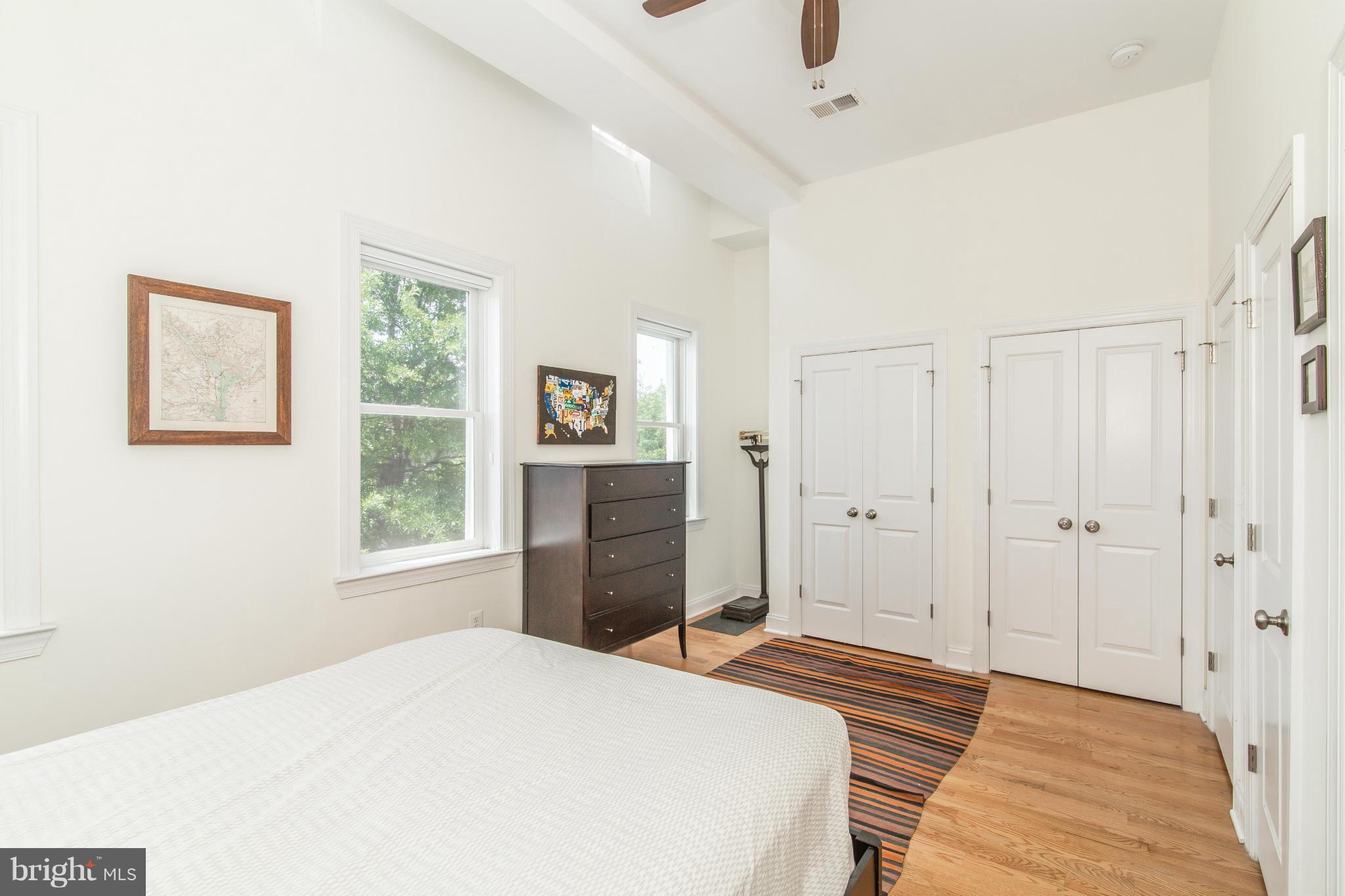 1849 3rd Street Northwest Washington, DC 20001 - Photo 12 of 23 a bedroom with a bed and a window