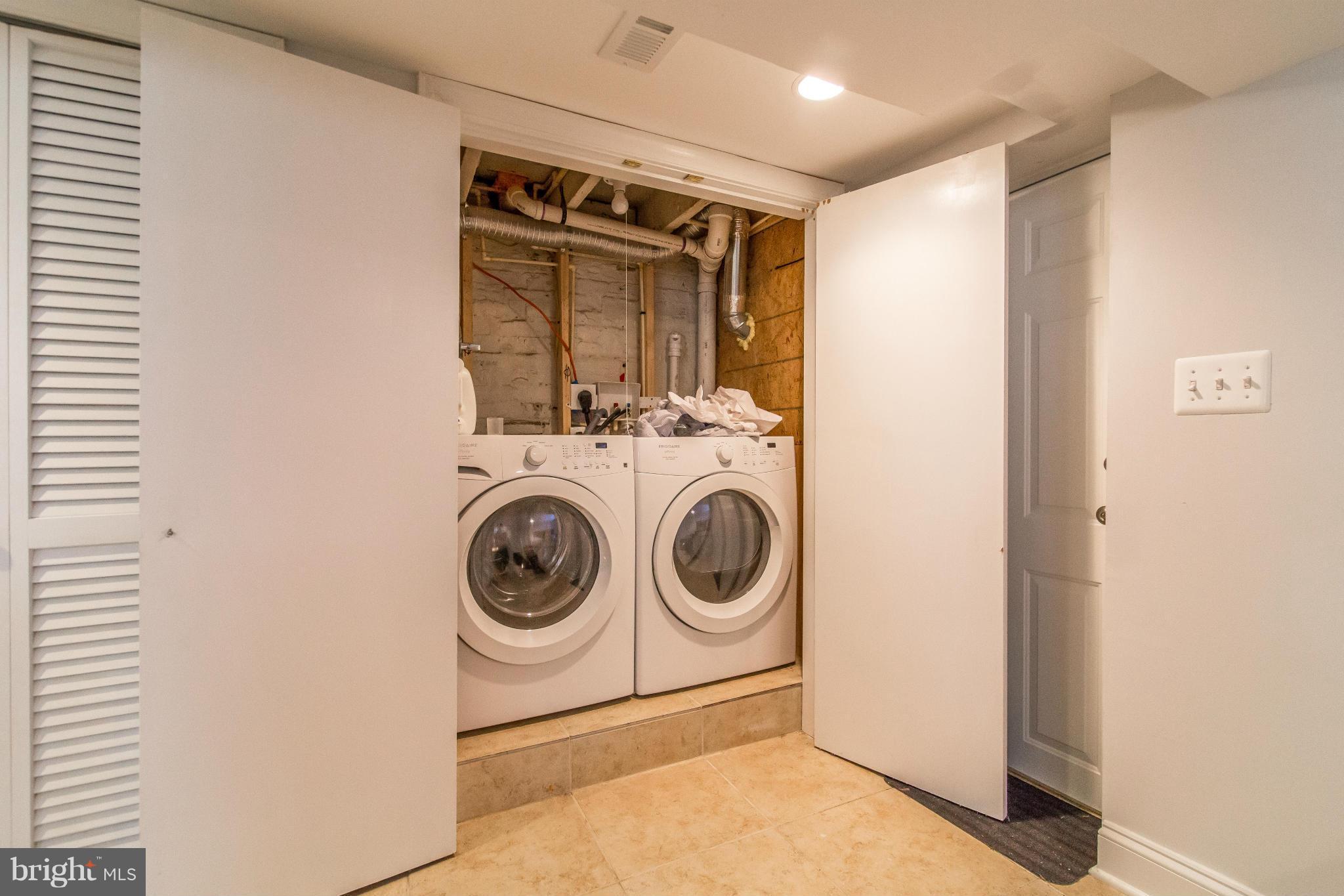 1849 3rd Street Northwest Washington, DC 20001 - Photo 17 of 23 a utility room with dryer and washer