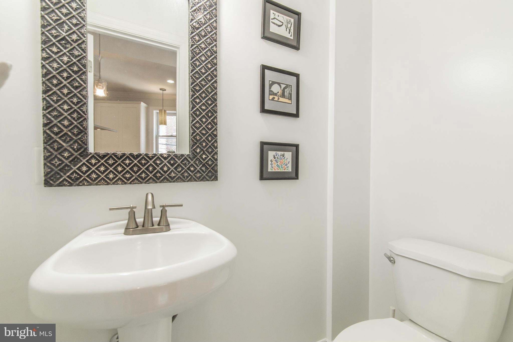 1849 3rd Street Northwest Washington, DC 20001 - Photo 10 of 23 a bathroom with a sink and a mirror