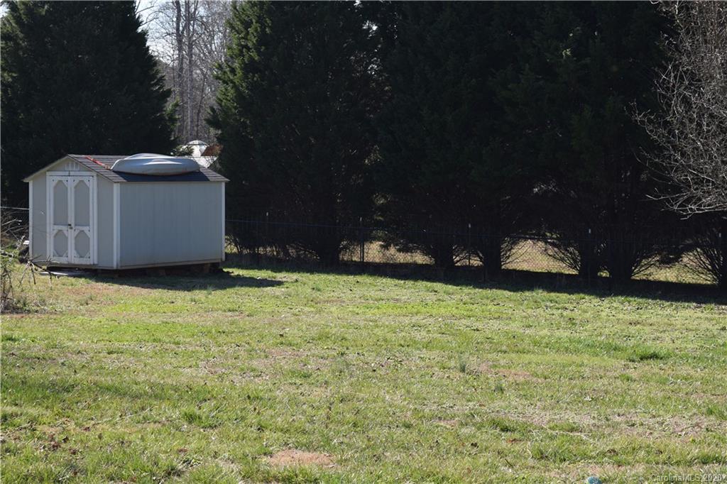 145 Rithmetic Road, Unit 75 Salisbury, NC 28147 - Photo 12 of 13 a view of a backyard