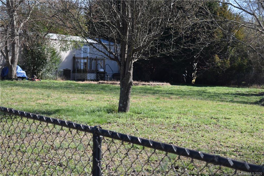 145 Rithmetic Road, Unit 75 Salisbury, NC 28147 - Photo 7 of 13 a view of a house with a yard