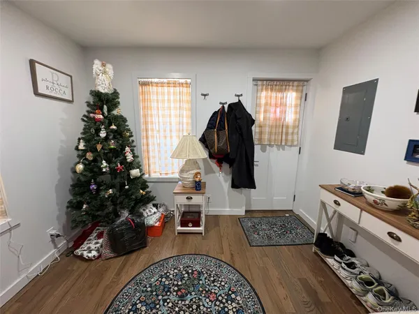 a living room with furniture and a rug