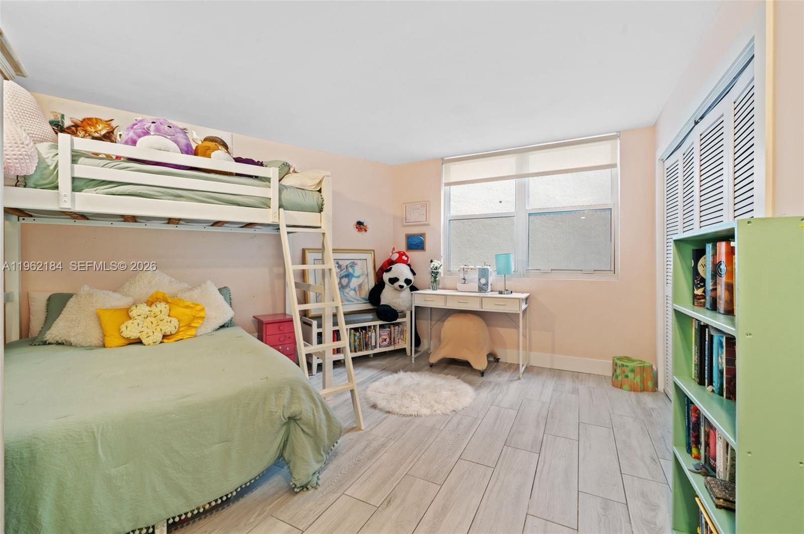 600 Grapetree Drive, Unit 3DS Key Biscayne, FL 33149 - Photo 17 of 33 a bed room with a bed and a tv