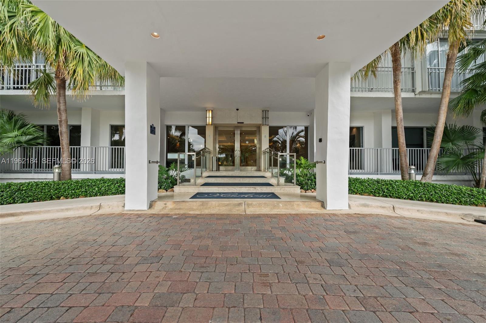 600 Grapetree Drive, Unit 3DS Key Biscayne, FL 33149 - Photo 21 of 33 a view of a building with a sidewalk