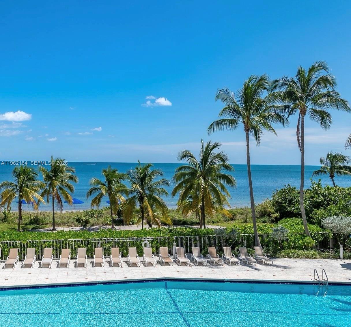 600 Grapetree Drive, Unit 3DS Key Biscayne, FL 33149 - Photo 27 of 33 Chaises and Unbrellas