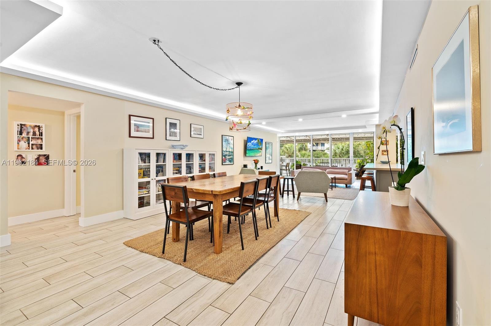 600 Grapetree Drive, Unit 3DS Key Biscayne, FL 33149 - Photo 3 of 33 a view of a dining room with furniture window and wooden floor