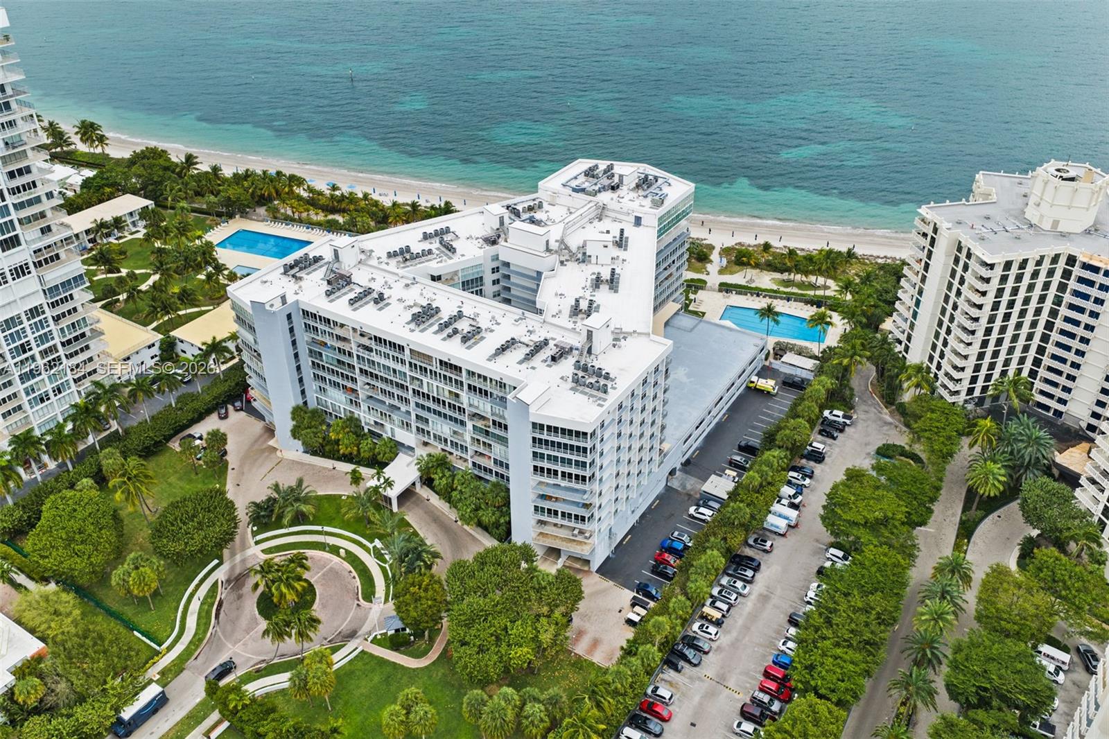 600 Grapetree Drive, Unit 3DS Key Biscayne, FL 33149 - Photo 31 of 33 a view of swimming pool with outdoor seating and plants