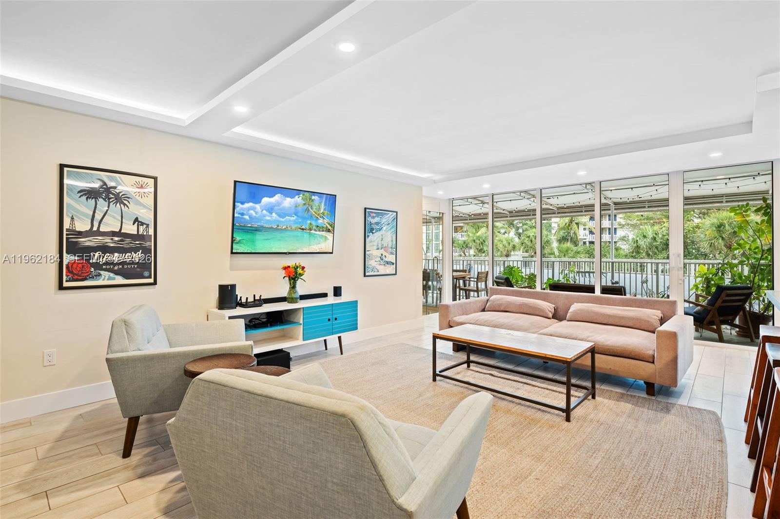 600 Grapetree Drive, Unit 3DS Key Biscayne, FL 33149 - Photo 5 of 33 a living room with furniture and a large window