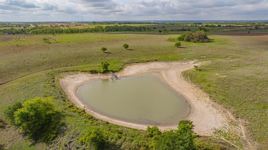 4 State Avenue Stephenville, TX 76401 - Photo 18 of 40 a view of a lake with a mountain in the background