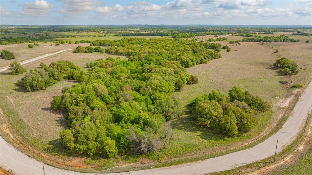 4 State Avenue Stephenville, TX 76401 - Photo 19 of 40 a view of a lake with a yard