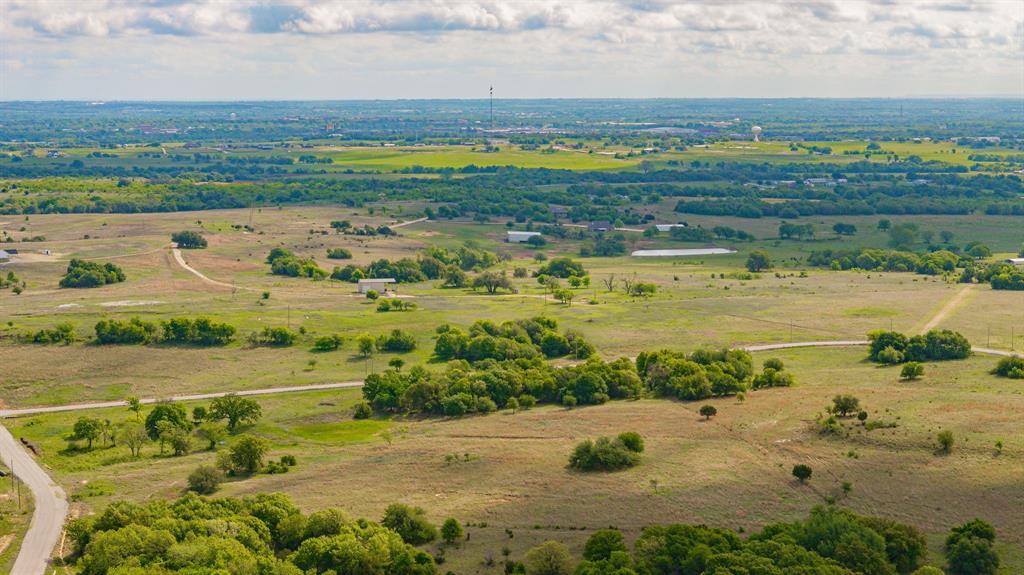 4 State Avenue Stephenville, TX 76401 - Photo 33 of 40 an aerial view of ocean and residential houses with outdoor space