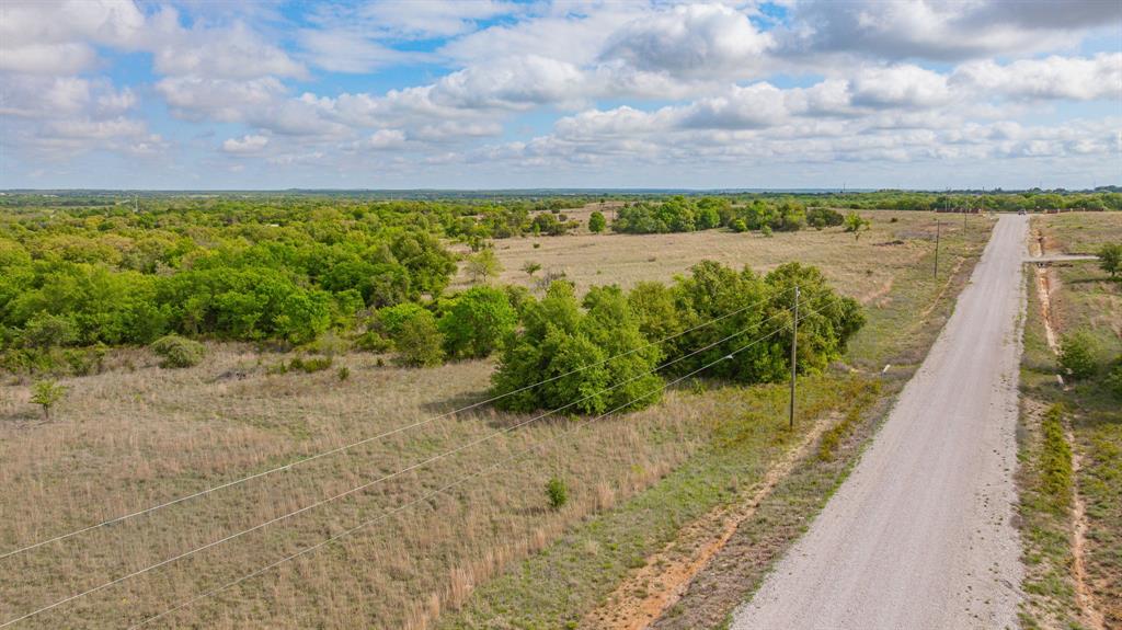 4 State Avenue Stephenville, TX 76401 - Photo 9 of 40 a view of a lake with outdoor space