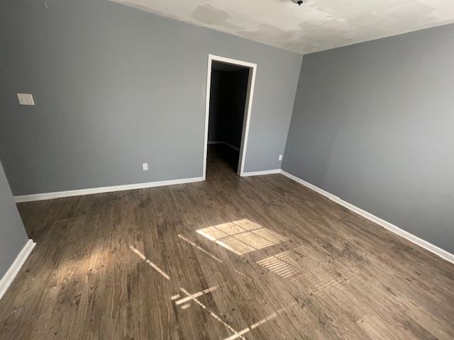 1572 Hanauer Street, Unit B Memphis, TN 38109 - Photo 6 of 11 a view of a room with wooden floor and white walls