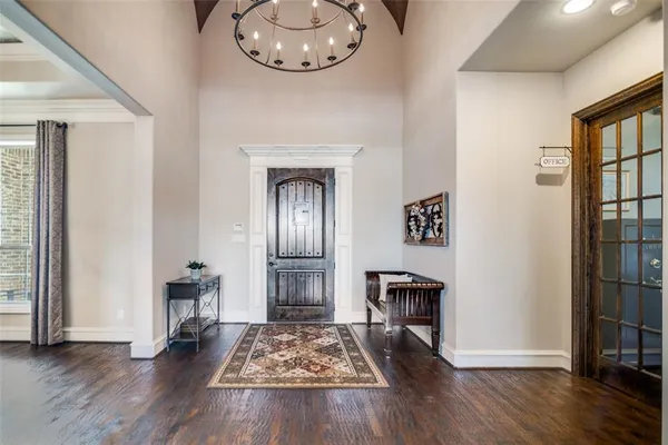 a view of a livingroom with furniture and wooden floor
