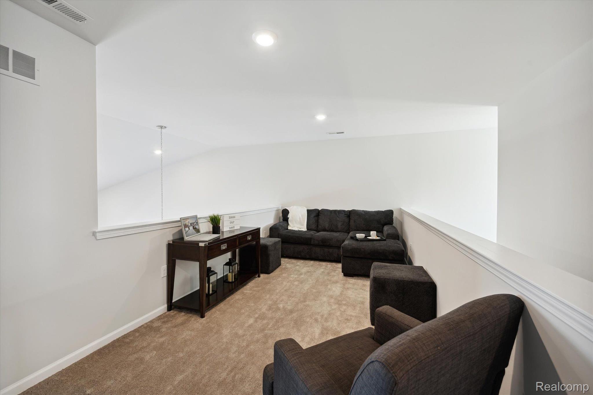 9917 Ridge Run Street, Unit 93 Howell, MI 48855 - Photo 16 of 21 2nd Level Loft Area