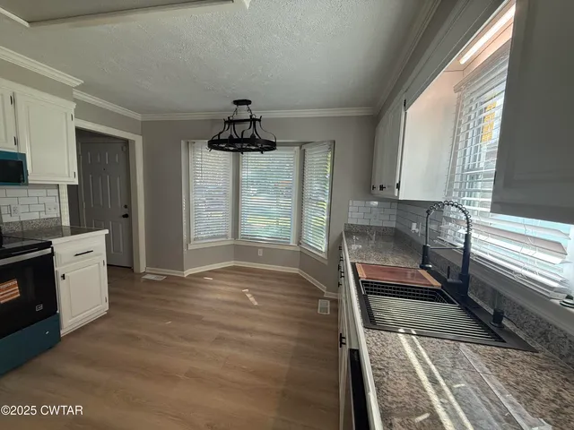 a view of kitchen and window