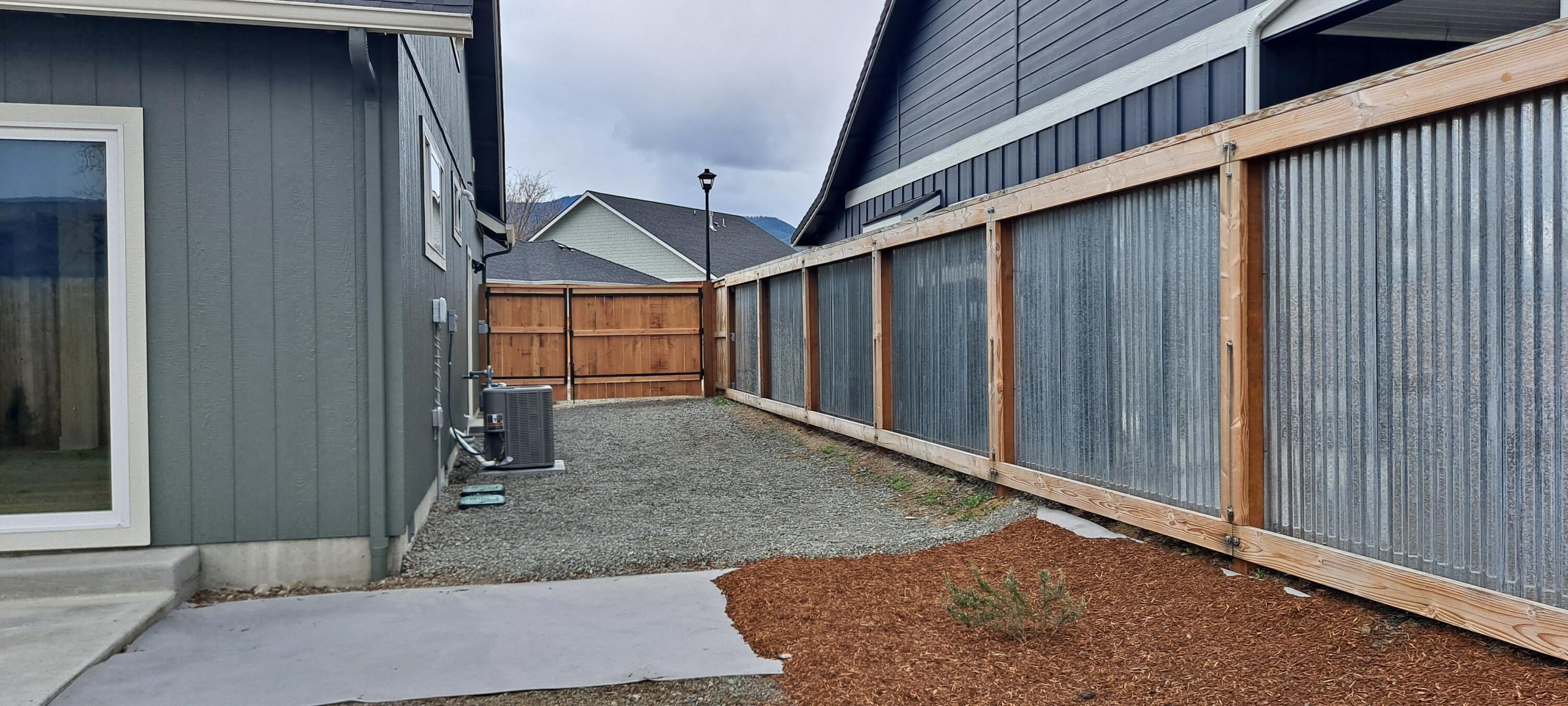 236 Samuel Lane Loop Road Phoenix, OR 97535 - Photo 21 of 30 Side yard with RV parking and 220 power