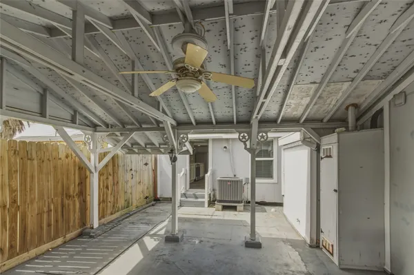 a swimming pool with palm tree