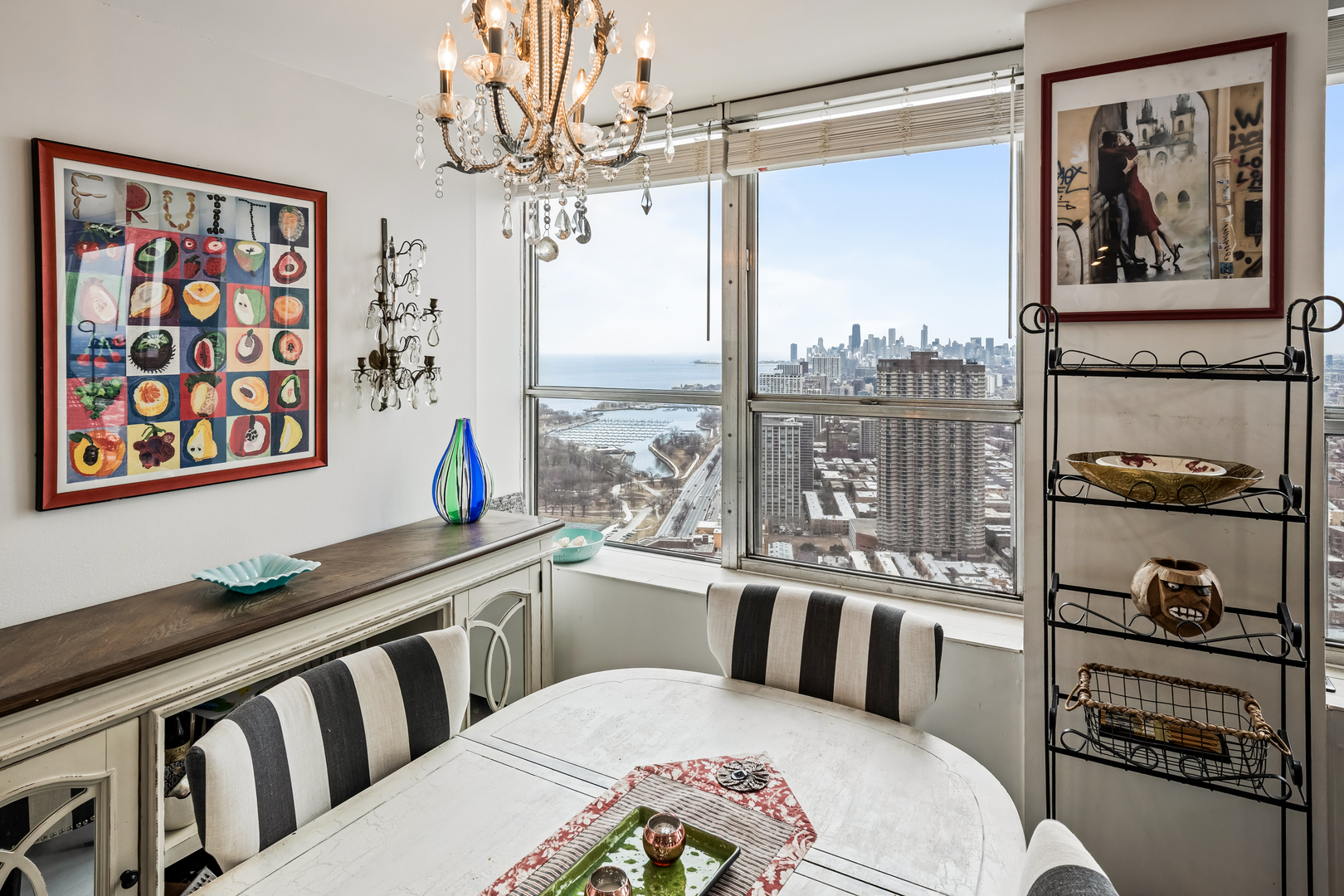 655 West Irving Park Road, Unit 5315 Chicago, IL 60613 - Photo 12 of 29 a bedroom with furniture and a large window