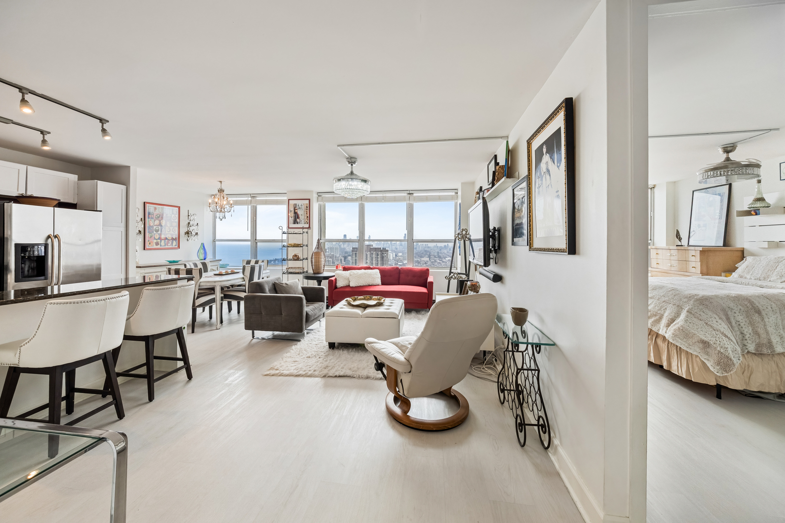 655 West Irving Park Road, Unit 5315 Chicago, IL 60613 - Photo 15 of 29 a living room with furniture and a flat screen tv