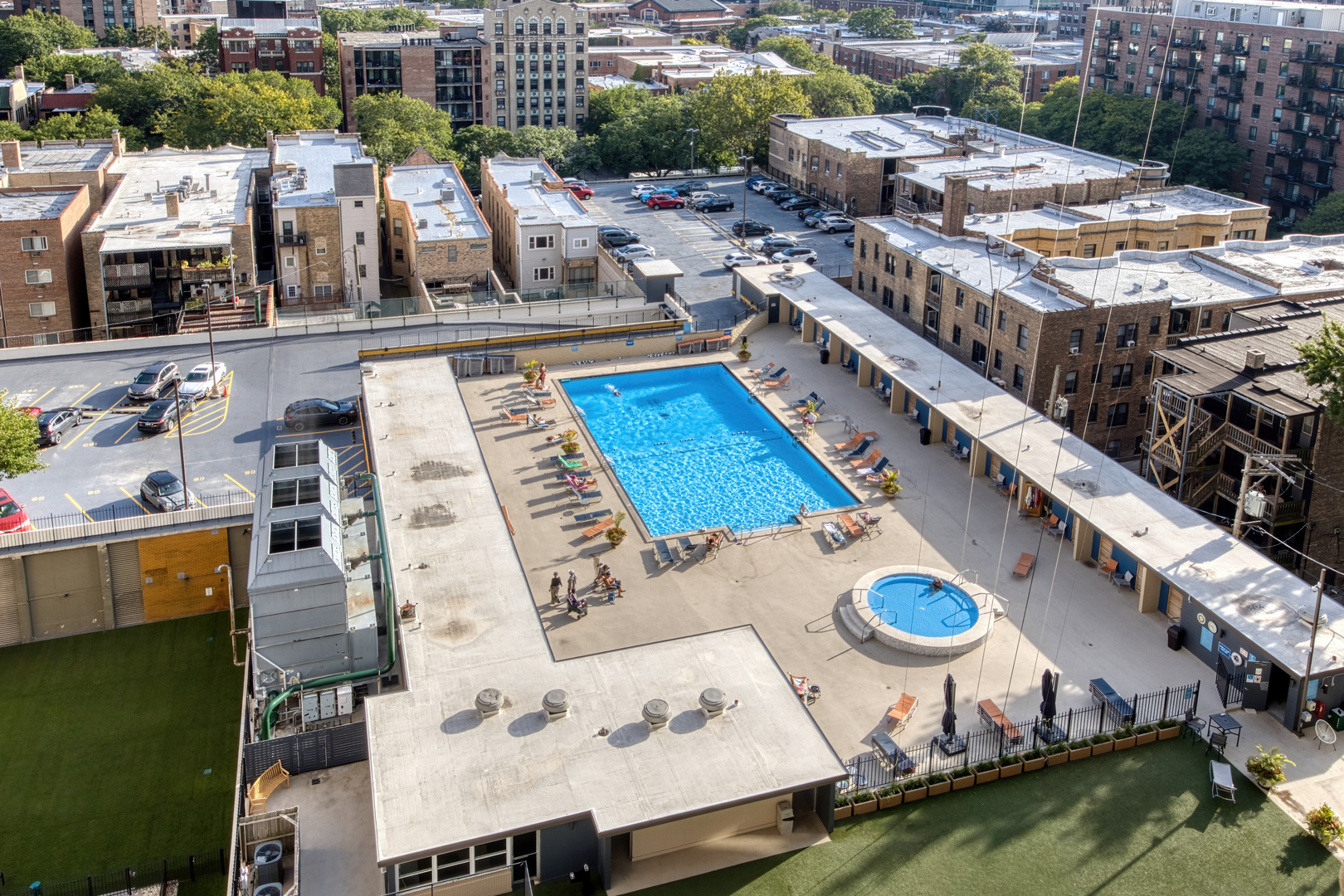 655 West Irving Park Road, Unit 5315 Chicago, IL 60613 - Photo 25 of 29 view of a house with swimming pool outdoor seating
