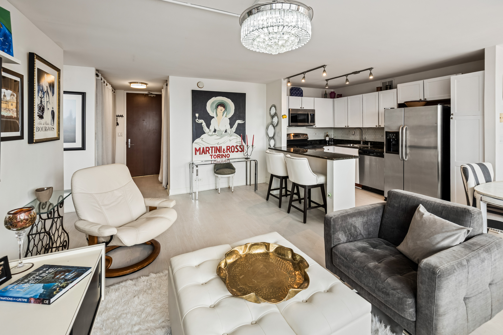 655 West Irving Park Road, Unit 5315 Chicago, IL 60613 - Photo 8 of 29 a living room with furniture and kitchen view