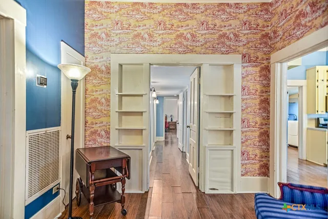a view of livingroom with furniture and wooden floor