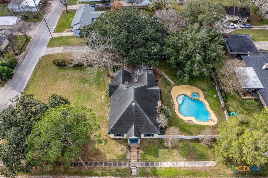 407 Robinson Street Edna, TX 77957 - Photo 41 of 41 an aerial view of a house with a swimming pool