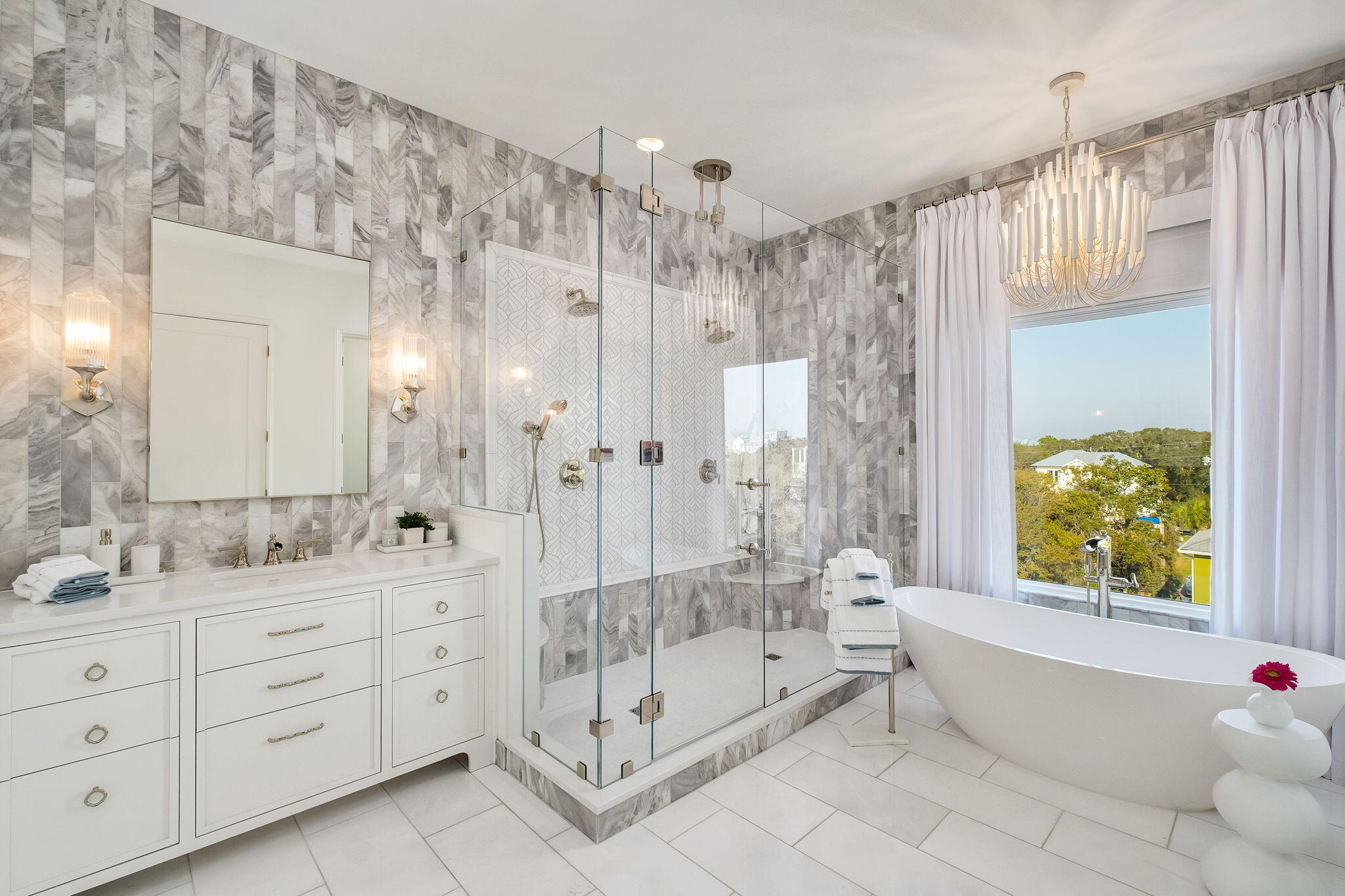 153 Gulf Point Road Santa Rosa Beach, FL 32459 - Photo 16 of 18 a spacious bathroom with a double vanity sink toilet mirror and bathtub